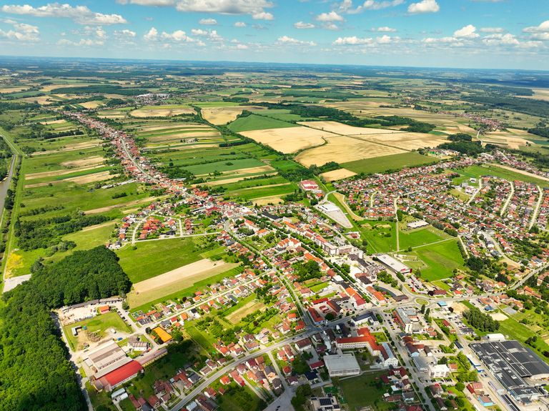 Stunning aerial view of Garešnica showcasing green landscapes and urban areas in summer.
