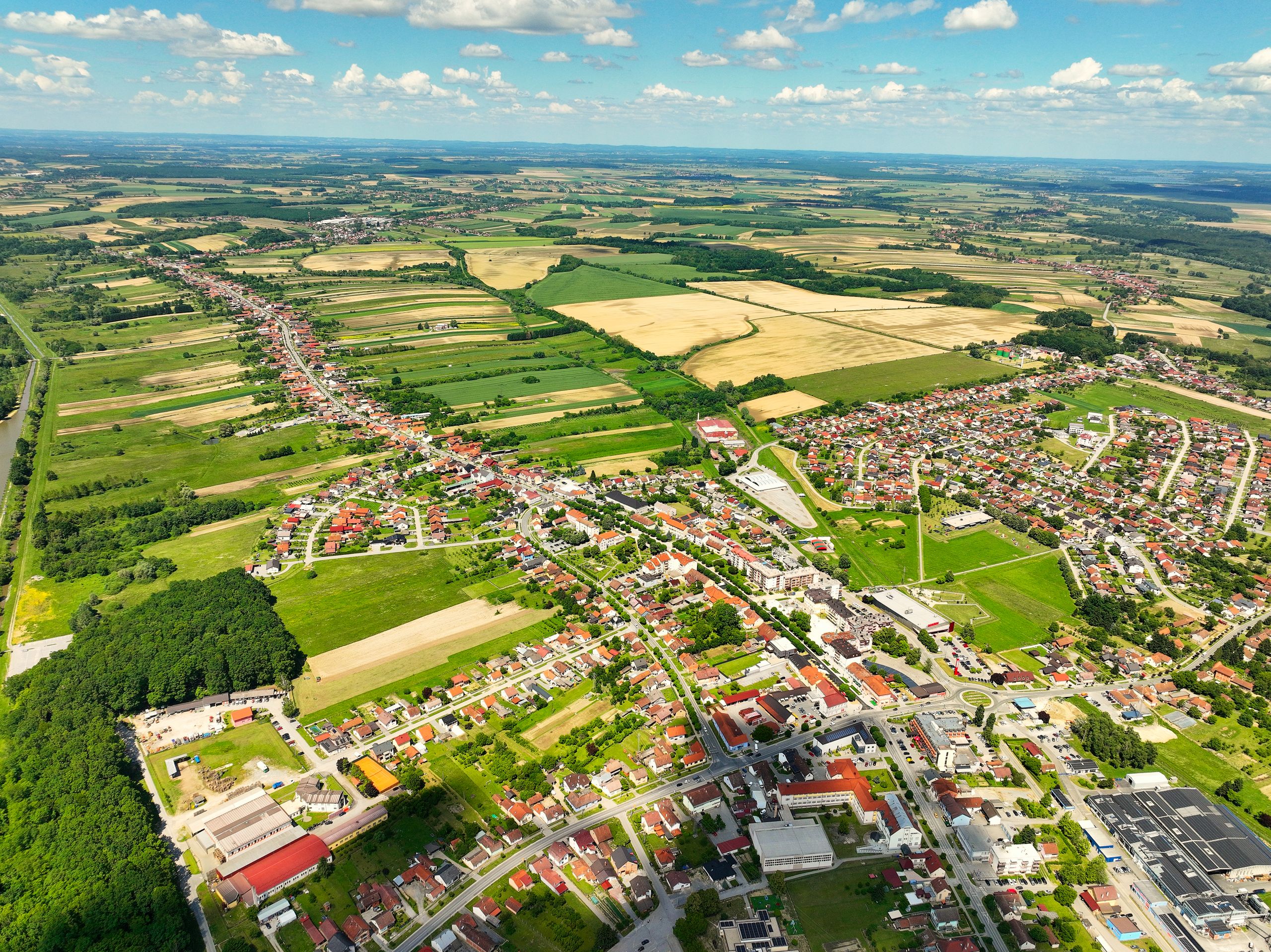 Stunning aerial view of Garešnica showcasing green landscapes and urban areas in summer.